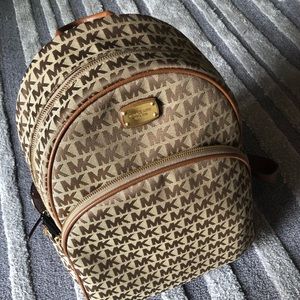 Brown Michael Kors backpack in mint condition